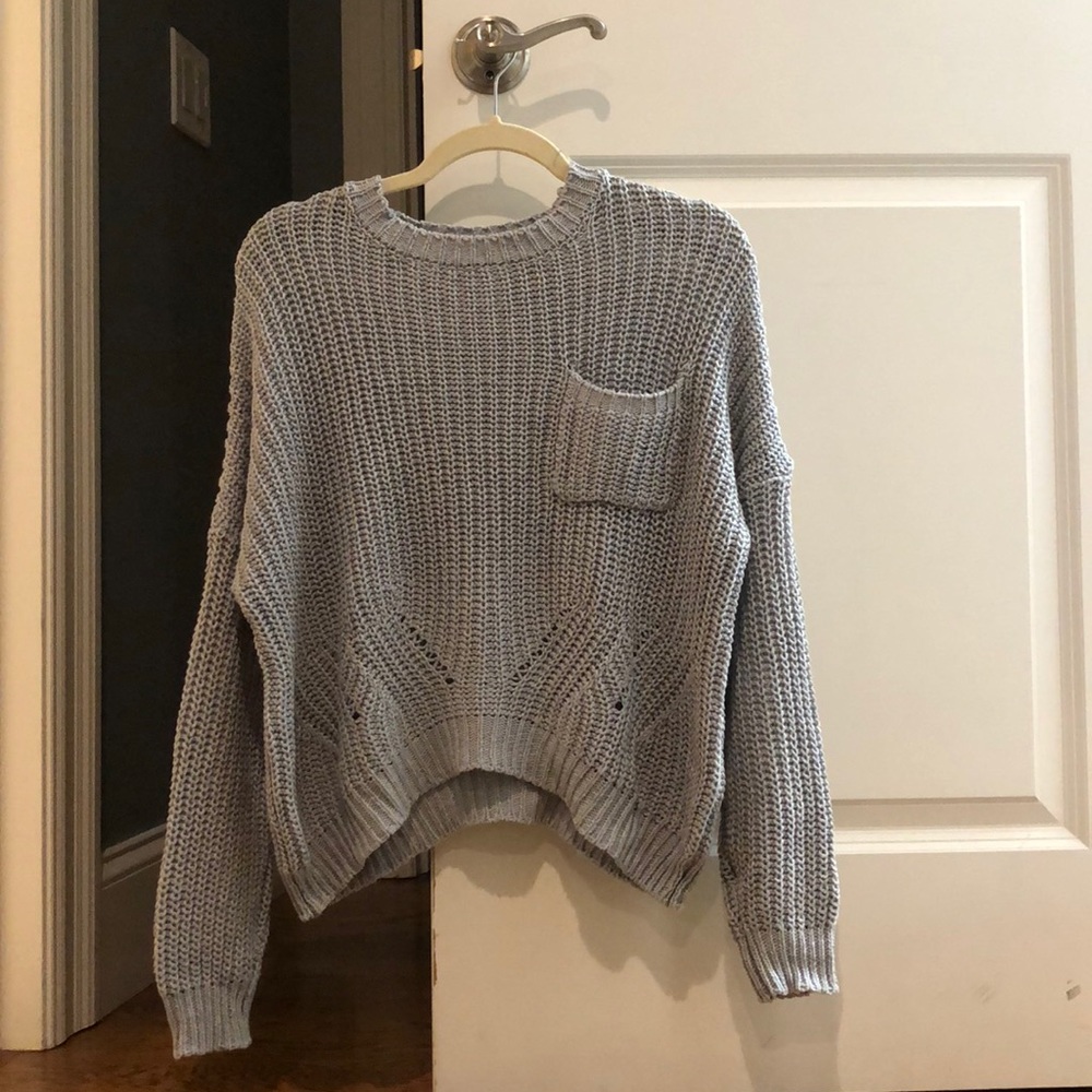 light blue sweater